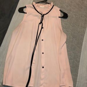 Pink button-down sleeveless top